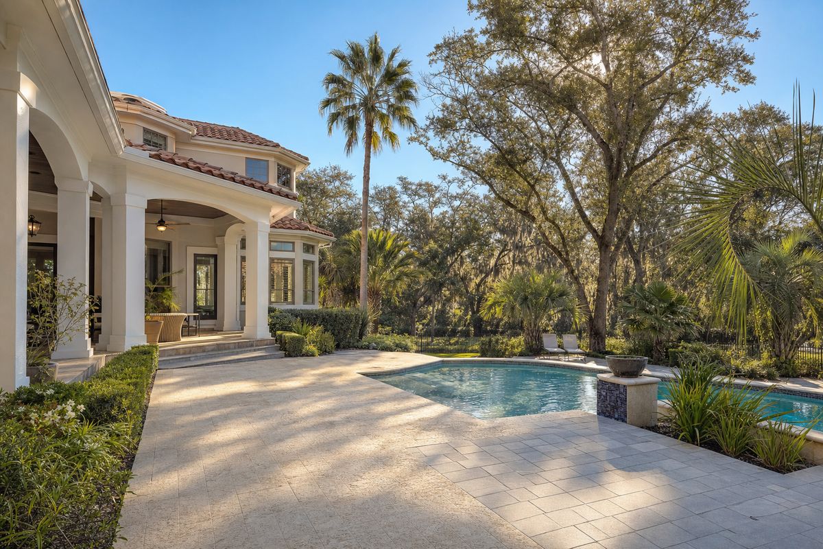 Travertine vs Concrete Pavers in Florida: Which Is Better for Your Yard?