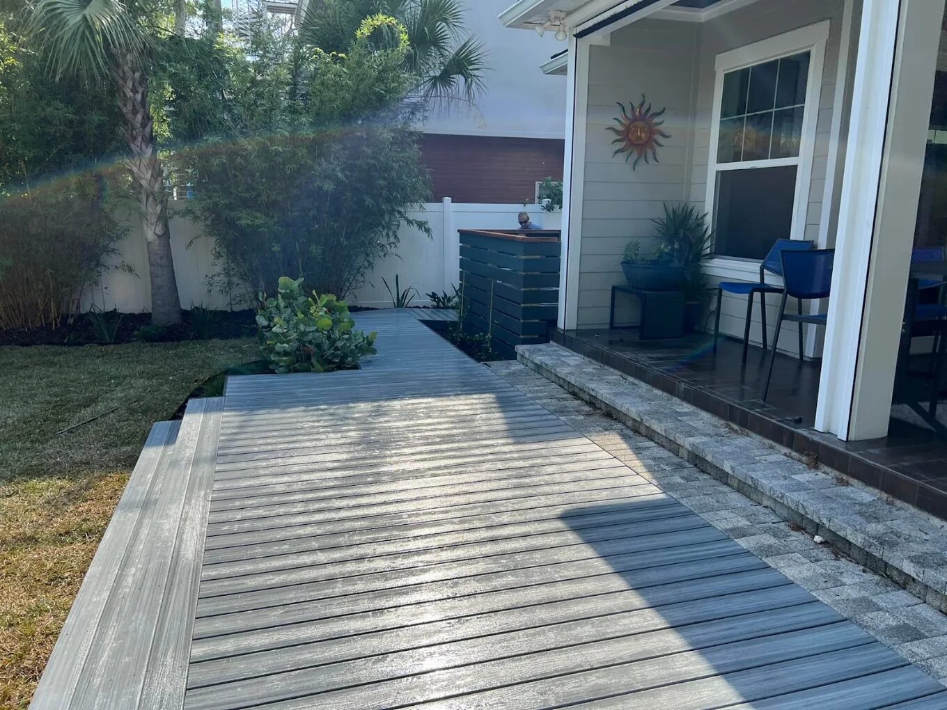 Gray composite deck walkway to paver patio and porch, Atlantic Beach FL