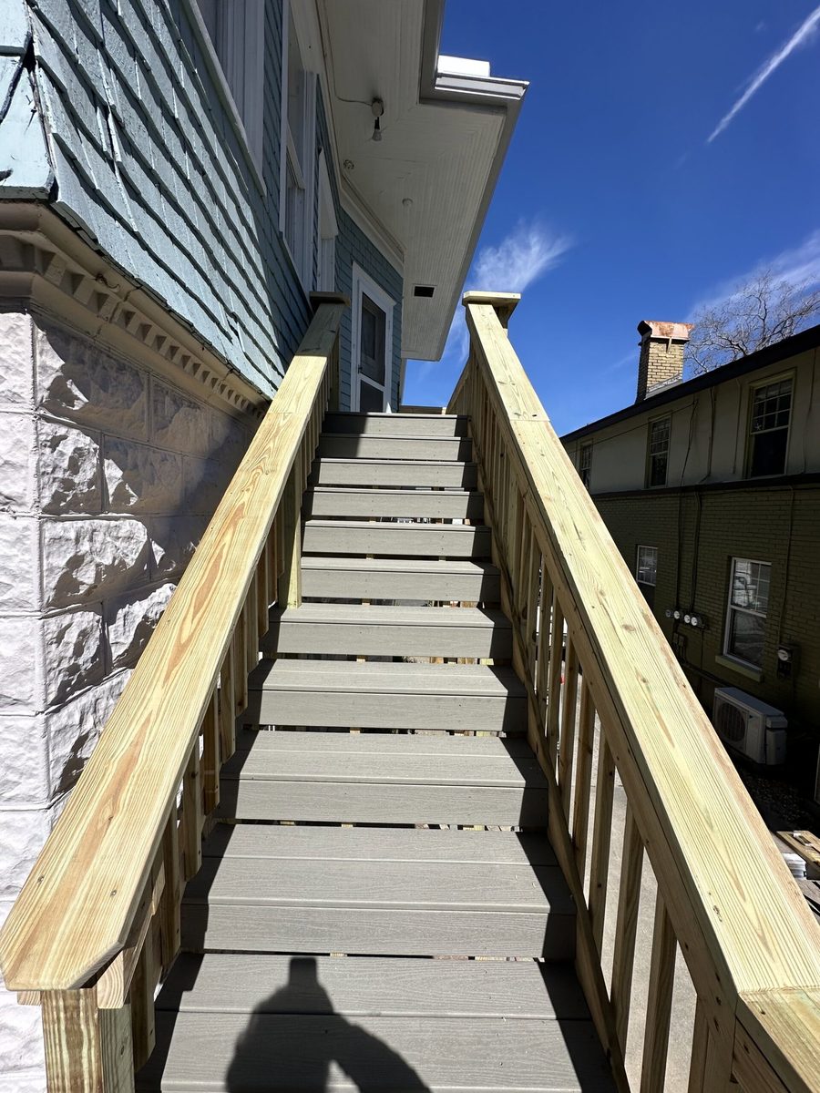 Composite stairway with treads and landing on a San Marco Jacksonville home