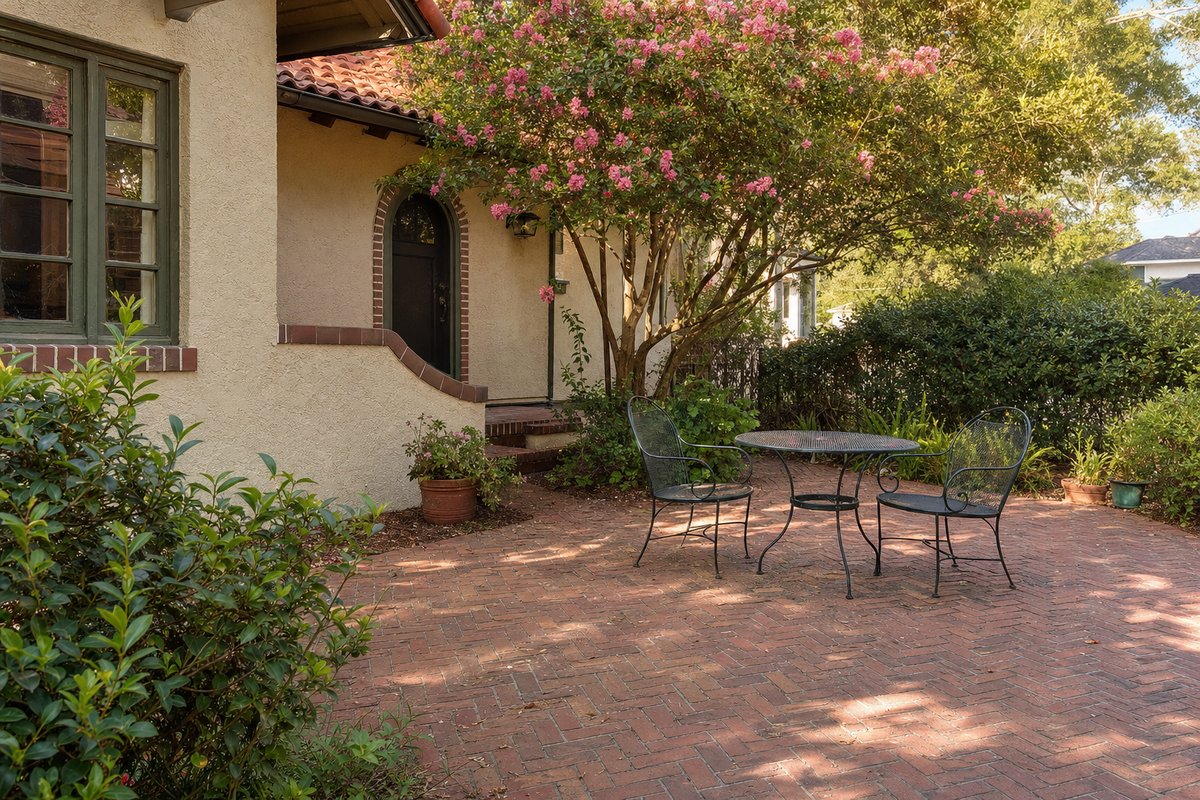 Belgard Toscana concrete paver patio with seat wall in a Julington Creek backyard